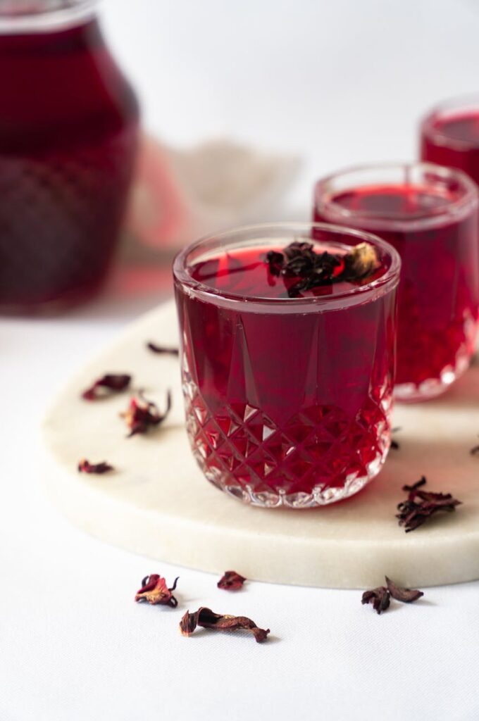 glasses with homemade fruit drink on table