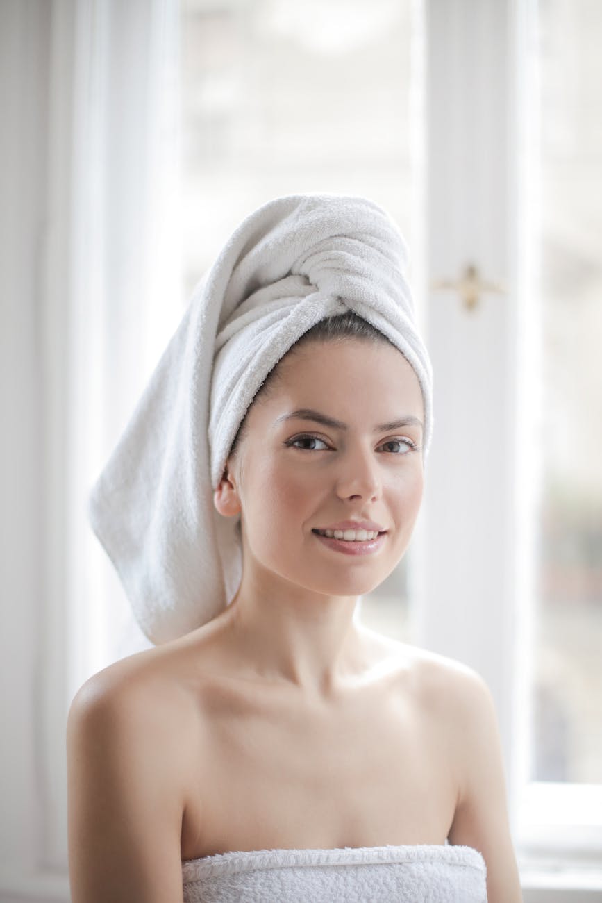 woman with white towel on head
